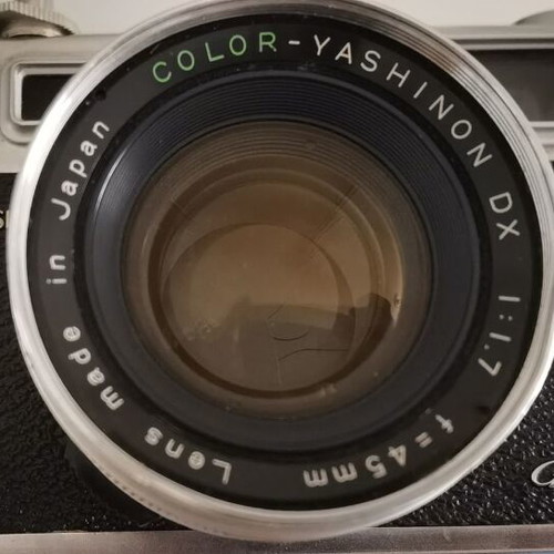 Yashica GSN Electro 35 camera used with Yashinon DX 45mm f/1.7 lens, case, and 2 flashes