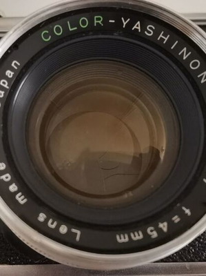 Yashica GSN Electro 35 camera used with Yashinon DX 45mm f/1.7 lens, case, and 2 flashes