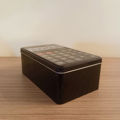 Metal storage box with calculator design, like new