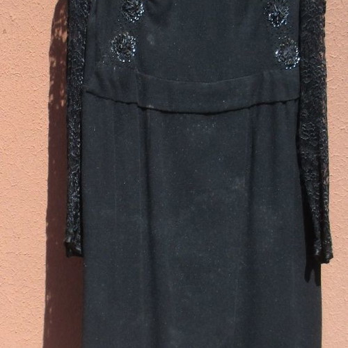 Vintage women's dress used from the 1960s with lace sleeves black
