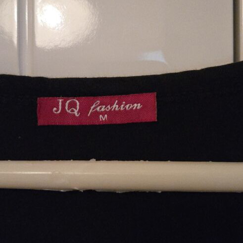 JQ Fashion black sleeveless top with metallic studs, used, size M