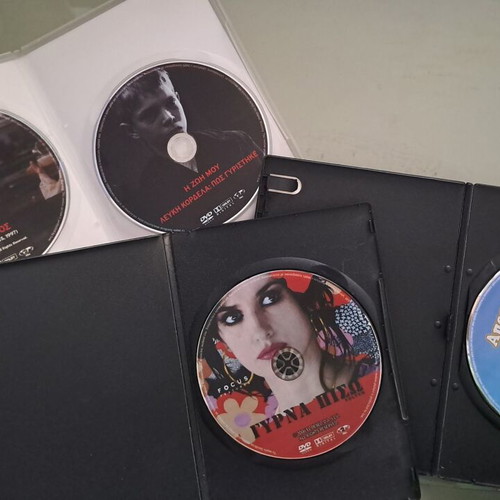 DVD collection with 4 movies and 2 documentaries, new