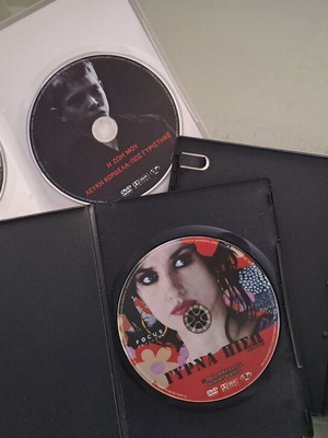DVD collection with 4 movies and 2 documentaries, new