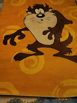 Children's rug used, khaki with Taz design