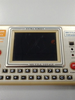 Shuttle Voyage MG-8 LCD Game & Clock μεταχειρισμένο, δεν λειτουργεί, 1982
