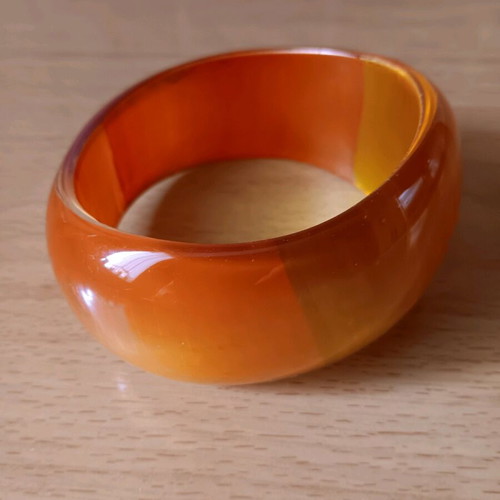 Acrylic bangle bracelet new, orange color