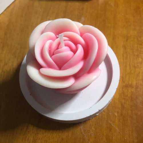 Rose candle new in plaster base