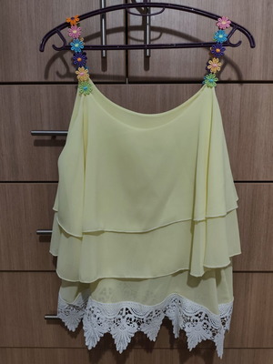 Women's yellow top like new with colorful flower straps and white lace trim