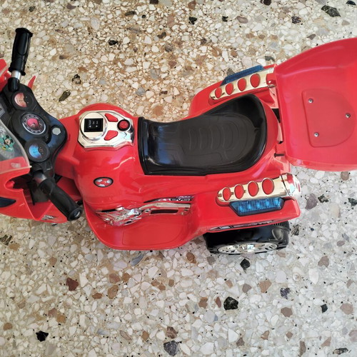 Battery-powered children's motorcycle used, needs battery replacement