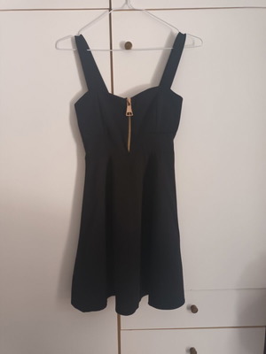 Dress black with front zipper, light chest padding, like new
