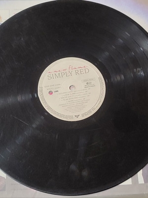 Simply Red vinyl record used with scratches