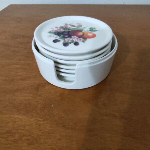 Vintage bakelite coasters like new with fruit design