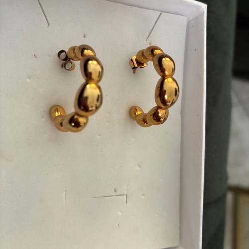 Steel gold hoop earrings new with impressive design