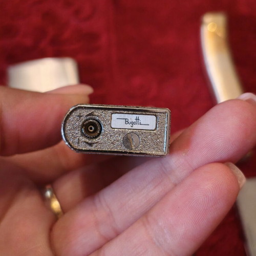 Lot of 7 Vintage lighters including Zippo, Porsche Design, Maruman