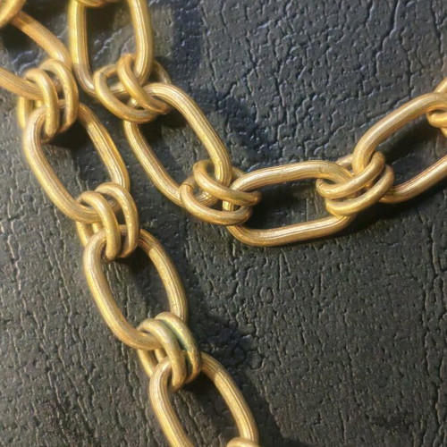 Long steel necklace chain like new, gold tone