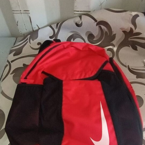 Nike backpack like new, sporty red with black details