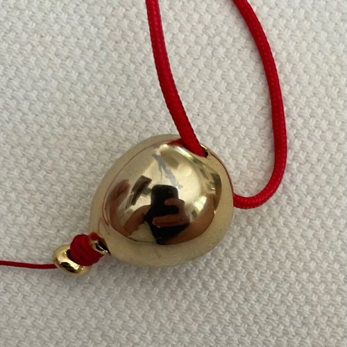 Kessaris necklace used with gold-plated balloon-shaped pendant