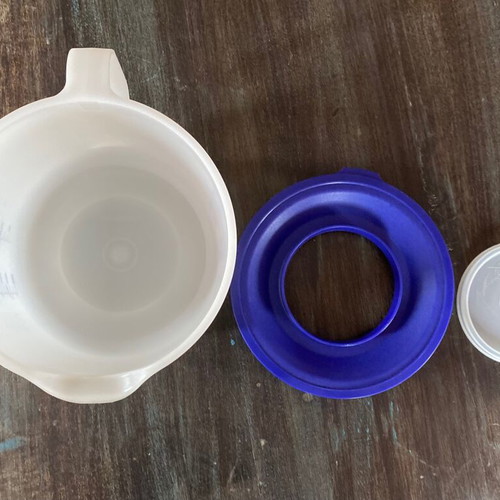 Vintage authentic Tupperware measuring cup unused