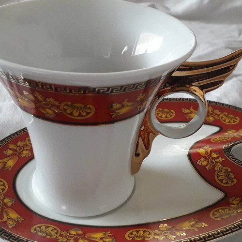 Pair of Limoges cups in white and red with gold and saucers new