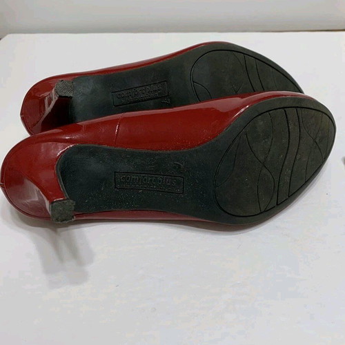 Red patent leather pumps