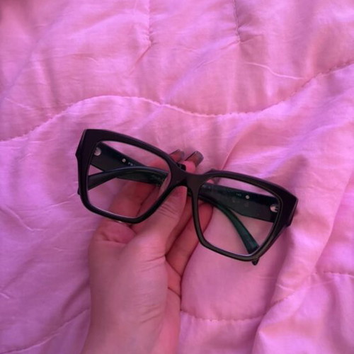 Prada eyeglasses black used with replaceable lenses