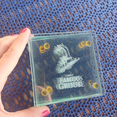 Glass coasters with some minor damage