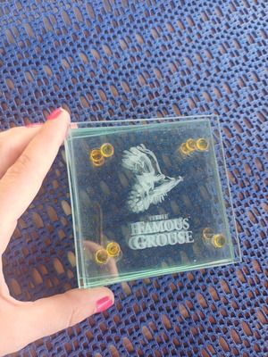 Glass coasters with some minor damage