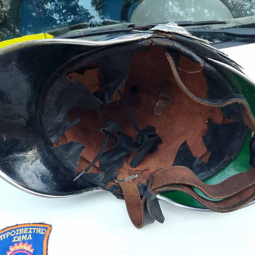 Firefighter officer helmet 1965-75 with full uniform insignia