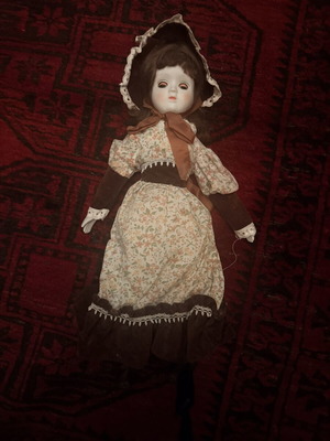 Vintage Porcelain Collectible Doll with Sleep Eyes mechanism used