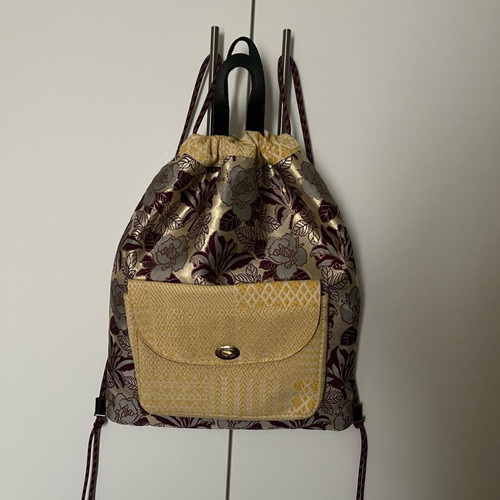 Boho backpack unused, gold shades