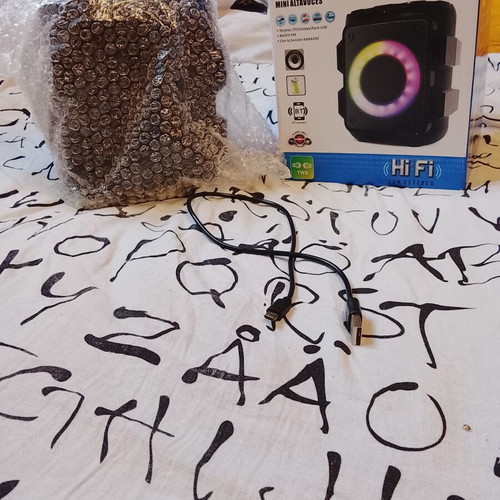 Mini Bluetooth Speaker like new with flashlight colors and karaoke