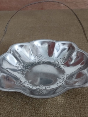 Vintage aluminium basket fontaniera with embossed flowers, used