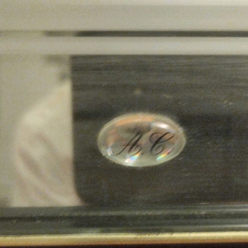 Silver icon used with mirror
