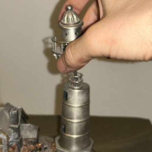 Vintage metal lighthouse decorative miniature with hidden compartment, like new