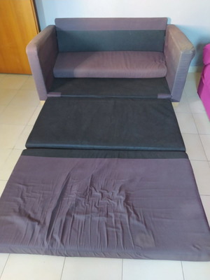 Compact sofa bed used with foldable cushions