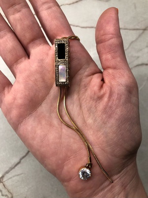 Gold necklace with rhinestones and geometric pendant like new