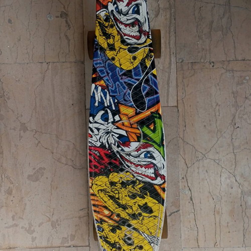 Penny Board skateboard like new with crazy graphics
