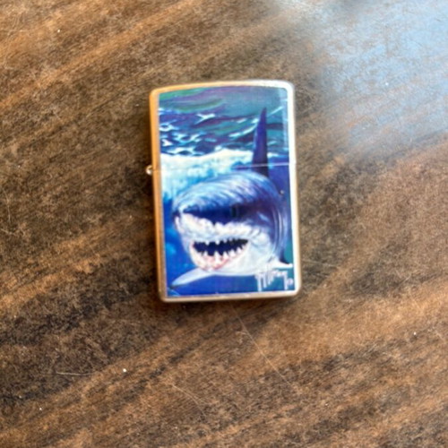 Zippo lighter like new with shark design