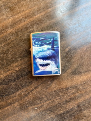 Zippo lighter like new with shark design