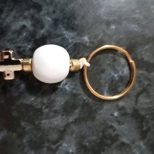 Handmade keychain, with a gold cross, white round wooden bead and white tassel, brand new