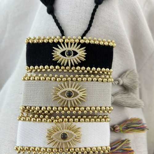 Fabric bracelet with metallic eye and gold beads, new