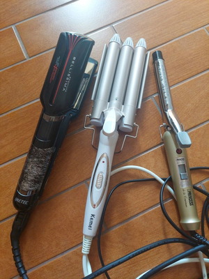 Hair straightener, curling iron and hair curler used