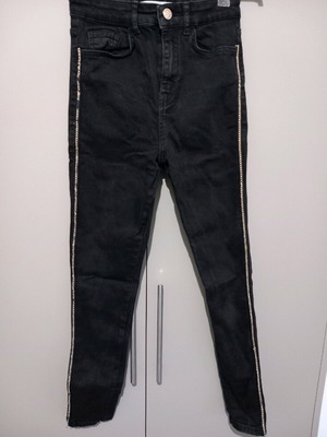 Black high-waisted jeans with gold details used Zara