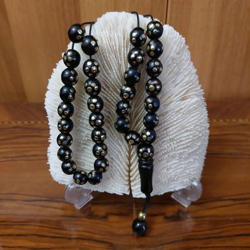 Worry beads with 33 ebony beads and golden copper inlays new