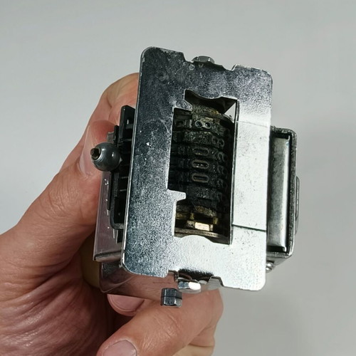 Vintage metal Great Wall Model 45 number stamp used