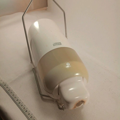 Tork dispenser device used
