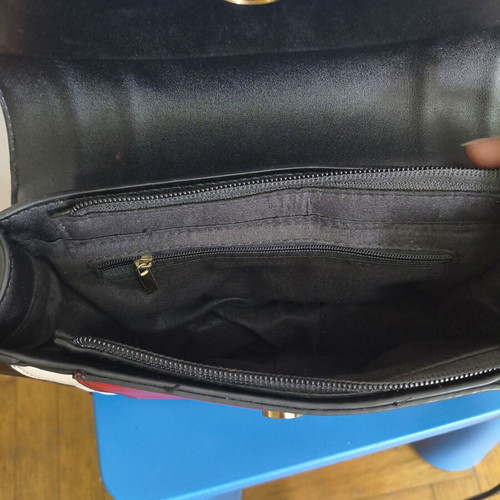 Shoulder bag with adjustable strap, black and red