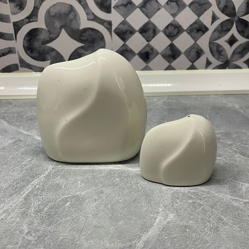 Arabia salt and pepper shakers set used, big and small size, one missing cap
