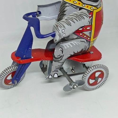Vintage metal elephant on tricycle like new