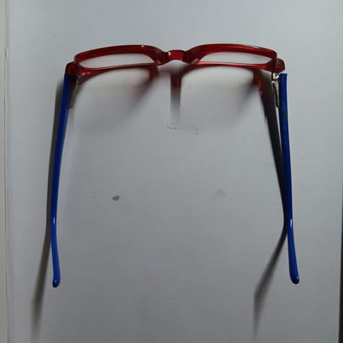 Children's glasses used, red and blue
